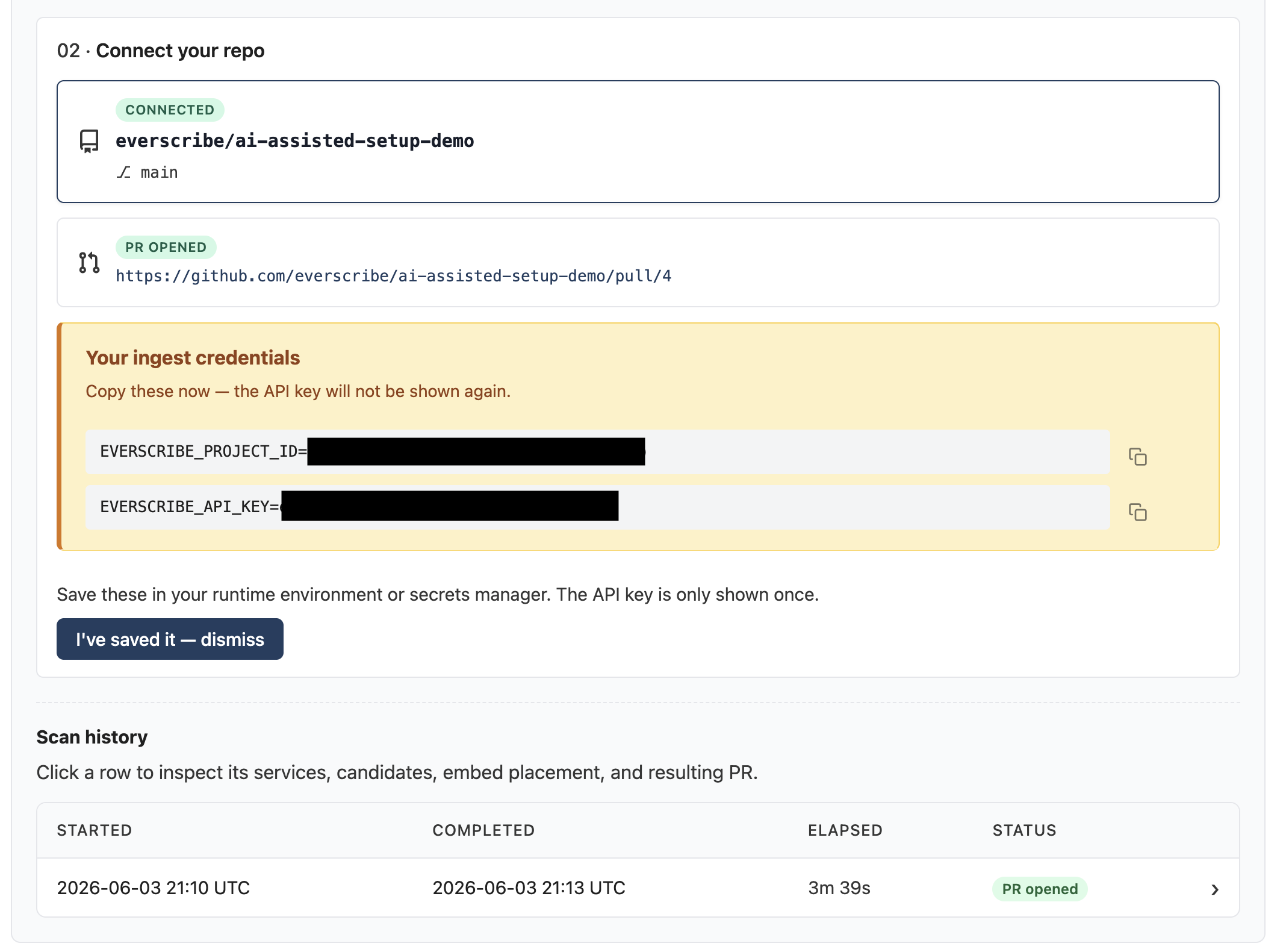The credentials banner inside the Configuration card: amber alert, two copyable env-var lines, an "I've saved it — dismiss" button.